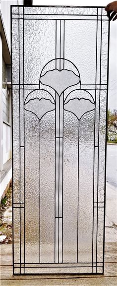 a stained glass door with an intricate design