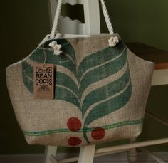 a handbag sitting on top of a wooden chair