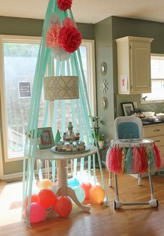 a birthday party with balloons and decorations