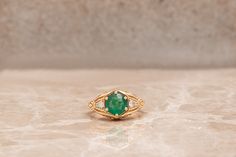 vintage emerald ring-art deco emerald ring-emerald ring-6 prong ring-emerald engagement ring-round emerald ring-edwardian emerald ring Main Stones Name: Green Emerald Main Stones Total Weight: 1 ct. approx. Main Stones Total Quantity: 1 Main Stones Color: Green Main Stones Shape: Round Customization: All the jewelry create per customer order. * Sizes available: 3 - 9. If you are interested in plus size ring from 10 US- 20 US Please let me know. * All the jewelry can be made in the following meta Vintage Emerald Ring, Art Deco Emerald Ring, Emerald Ring Vintage, Plus Size Rings, Prong Ring, Green Emerald Ring, Ring Emerald, Engagement Rings Round, Emerald Engagement