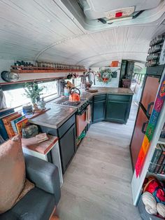 the kitchen and living area of an rv