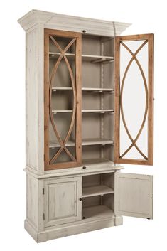 a white cabinet with two doors and a mirror