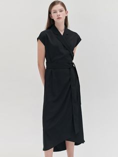 This is a trendy and feminine dress by NILBY P that is made out of high quality and sturdy material. With distinctive mood of the design and comfortable wear, you can style it for your casual daily outfit.- Light weight without lining- Adjustable strap on the waist- Feminine and modern mood Modern Cotton Midi Dress, Chic Cotton Wrap Dress, Midi Length, Elegant Belted Cotton Maxi Dress, Elegant Belted Cotton Midi Dress, Casual Wrap Dress For Work, Versatile Relaxed Fit Dress For Work, Versatile Summer Workwear Dresses, Modern Black Cotton Dresses, Belted Cotton Dress For Formal Occasions