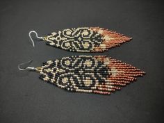 Black and Gold Lace Beaded Earrings Beadwork Fringe Aesthetic - Etsy Artistic Beaded Gold Jewelry, Artistic Gold Beaded Jewelry, Artistic Handmade Jewelry For Festive Occasions, Handmade Artistic Earrings With Round Beads, Unique Beaded Earrings For Festive Occasions, Artistic Handmade Earrings With Round Beads, Unique Festive Beaded Earrings, Unique Beaded Earrings With Bead Caps For Gift, Gold Bohemian Beaded Earrings For Gift