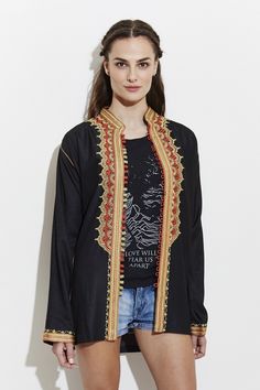 Moroccan jacket with a Middle Eastern-kimono motif. This jacket is expertly crafted from cotton-twill, trimmed in yellow embroidered. Wear yours alongside skinny jeans or shorts for a Coachella festival look. Spring Cotton Outerwear With Embroidered Cuffs, Winter Outerwear With Gold Embroidery And Long Sleeves, Embroidered Yellow Outerwear For Spring, Yellow Embroidered Spring Outerwear, Folk Style Summer Outerwear, Spring Yellow Embroidered Outerwear, Cotton Outerwear With Geometric Embroidery For Fall, Yellow Embroidered Outerwear For Fall, Embroidered Yellow Outerwear For Fall