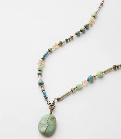 This handcrafted necklace is made of an assortment of earthy toned stones Homemade Necklaces Ideas, Artisan Beaded Amazonite Jewelry, Artisan Amazonite Beaded Jewelry, Handmade Green Turquoise Necklace In Amazonite, Handmade Green Turquoise (amazonite) Necklace, Hand-strung Green Amazonite Jewelry, Green Amazonite Hand-strung Jewelry, Earthy Turquoise Gemstone Beaded Necklaces, Green Amazonite Beaded Necklaces