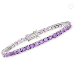 Classic Meets Vibrant In This Vivid Purple Tennis Bracelet. Sterling Silver Settings Host 7.00 Ct. T.W. Of Sparkling Amethyst Rounds. Double Latch Safety. Box Clasp, Purple Amethyst Tennis Bracelet. Comment With Questions! Brighton Charm Bracelet, Rustic Cuff Bracelets, Nail Bracelet, Peridot Bracelet, Friendship Bracelets With Beads, Heart Pendant Gold, Rhinestone Heart, Silver Bangle Bracelets, Bar Bracelets