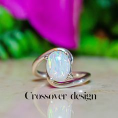 🌟 Exquisite Oval White Opal Silver Ring - A Timeless Gift for Every Special Occasion 🌟 ✨ Elevate your style with our Handcrafted Oval White Opal Silver Ring, a stunning piece of Mexican artisan jewelry that exudes elegance and sophistication. Perfect for anniversaries, Mother's Day, or celebrating an October birthday, this luxurious silver ring is a meaningful gift for any special moment. 💍✨ Handcrafted by skilled artisans, this ring features a beautiful 8mm x 10mm oval cabochon-cut opal, set Oval Opal Ring, 14th Wedding Anniversary, Opal Silver Ring, White Opal Ring, October Birthday, Mexican Jewelry, Timeless Gifts, October Birthstone, Silver Rings Handmade