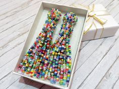 Colorful beaded tassel earrings Multicolor clip on earrings | Etsy Multicolor Beaded Tassel Earrings For Party, Colorful Beaded Round Clip-on Earrings For Gift, Colorful Beaded Round Clip-on Earrings As Gift, Multicolor Beaded Clip-on Earrings For Parties, Multicolor Beaded Tassel Earrings For Gift, Multicolor Beaded Drop Clip-on Earrings, Multicolor Beaded Clip-on Drop Earrings, Beaded Dangle Clip-on Earrings Gift, Multicolor Tassel Earrings With Dangling Beads As A Gift