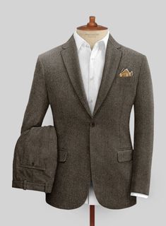 A classic design with a modern silhouette, our Tweed Suit is a must-have for every modern gentleman. Crafted from wool, the unique tweed fabric characterized by its herringbone weave structure that is famous for its warmth and durability makes this suit an ideal transitional piece for a wedding, gala, or prestigious evening event, where you seek to leave a lasting impression, this jacket is the epitome of polished refinement.  Look Includes   Vintage Dark Brown Herringbone Tweed  Horn Brown Butt Tweed Suit, Herringbone Tweed, Tweed Suits, Modern Gentleman, Cuffed Pants, Tweed Fabric, Wool Suit, Italian Fabric, Double Breasted Suit