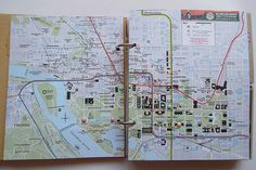 an open book with a map on it