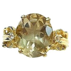 14k yellow smoky yellow Quartz and Diamond, 3.23 Grams TW. The dimensions are approximately 12 mm x 8mm. Approximately 3 carats. Marked 14k. Approximate size 7.0. Yellow Quartz, 3 Carat, Yellow Gold Rings, Floral Rings, Gold Rings, Jewelry Rings, Yellow Gold, Ring, Yellow