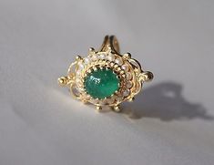 Vintage-14t. Yellow Gold, Pearl, & Emerald Ring | eBay Pearl Emerald Engagement Ring, Vintage Yellow Sapphire Ring, Vintage Emerald Jewelry, Emerald Gold Ring Vintage, Unique Emerald Ring, Handmade Luxury Emerald Ring For Formal Occasions, Luxury Handmade Emerald Ring For Formal Occasions, Antique 14k Stamped Emerald Ring, Wedding Emerald Cabochon Ring In 14k Gold