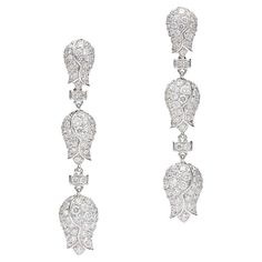 Earrings in 18kt white gold set with 242 diamonds 3.96 cts Luxury Platinum Diamond Earrings With Accents, Luxury Diamond Bridal Earrings With Pave Setting, Luxury White Gold Bridal Earrings With Pave Setting, Luxury Platinum Earrings With Single Cut Diamonds, Luxury Platinum Bridal Earrings With Diamond Accents, Hand Set White Gold Diamond Earrings For Evening, Hand Set Platinum Diamond Earrings, Luxury Silver Diamond Earrings With Pave Setting, Hand-set White Gold Diamond Earrings In Platinum