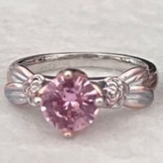 Nwot Sterling Silver And Pink Stone Solitaire Ring. Stamped 925. Measures: Size 6. Condition: Nwot Great Silver Sterling Flower Ring With Accent Stones, Silver Birthstone Ring With Center Stone, Silver Solitaire Flower Ring For Anniversary, Silver Flower Ring With Center Stone For Promise, Silver Flower Ring With Accent Stones For Promise, Pink Flower Ring, Pink Stone Ring, 6 Rings, Pink Ring