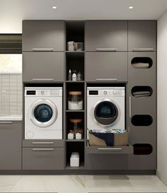 a washer and dryer sitting in a room next to each other on shelves