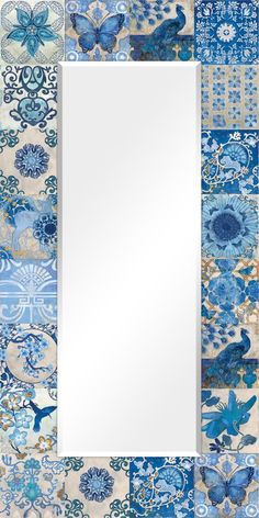 a mirror with blue and white designs on it