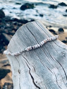 Approx. 16"-17" in Length and 1/4" wide. Premium Quality Cone Shell Choker NecklaceWe string these here in Maui using real shells from the Philippines, so no two are alikeTwist-Barrel Clasp. We also have puka shell stretch bracelets. Shell size and colors vary, no two are alike. The word "puka" means "hole" in the Hawaiian language, which in the case of these necklaces refers to the hole in the end of each shell where they are strung. Hand-made in Maui using real seashells from the Philippines.