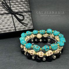 Looking for a funky and budget-friendly present? You're in luck! Check out these adjustable beaded skull bracelet set, perfect for anyone - whether you're dressing up for Halloween or just looking to add some flair to your casual wear. These handcrafted bracelets by CALACAMANIA™ are great for both men and women, and they'll bring a touch of Mexican Dia de Muertos inspiration to your outfit. Skull Beads Multilayered Bracelet Set: Turquoise, Bone/Beige, and Black Unisex stacked skull beaded wristb Casual Adjustable Skull Beaded Bracelets, Handmade Casual Skull Bracelet, Punk Black Skull Bracelets, Tattoo Fashion, Handmade Black Skull Bracelet, Edgy Skull-shaped Metal Bracelets, Skull Beads, Skull Bracelet, Handcrafted Bracelets