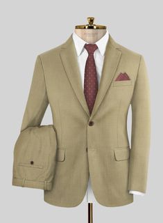 When it comes to high-quality clothes and luxury craftsmanship, Napolean is hard to beat. Our Napolean Sahara Khaki Wool Suit is crafted from wool blend with the natural elegance of wool with durability, versatility and stress-free comfort. Cut to a tailored fit in a fabric that's almost plain until you get up close – a fine structure gives it plenty of texture and couldn't be easier to style.  Look Includes   Napolean Sahara Khaki Wool Fabric  Two Button Jacket Style  Notch Lapel  Horn Brown Buttons  Single Vent  Three Cuff Buttons  Two Welted Back Pockets on Trousers    Click 'Customize Now' to modify the look if needed.   Lining: Viscose, Dry Clean, Pants can be lightly washed. Grey Tweed Suit, Herringbone Tweed Jacket, White Linen Suit, Green Velvet Jacket, Peaky Blinders Suit, Royal Blue Suit, Blue Chinos, Herringbone Tweed, Beautiful Suit