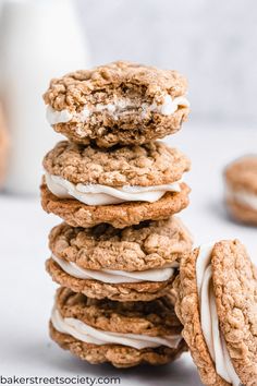 a stack of cookies with white frosting on top