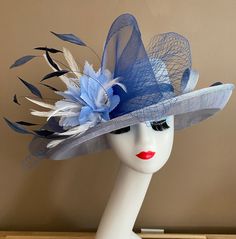 "Three layers of sinamay with beautiful bow and feather flowers, elegant, light and comfortable to wear. Perfect for weddings, Royal Ascot horse races, cocktails, tea party, Mother's Day, Easter, derby... Warm tips:  ❤️If you are looking for a customized piece, please send me a message and let's create something unique just for you!  ❤️Group discount on 3 or more pieces, please contact me for further information on group discount. ❤️Due to the nature of my items, I do not accept return or exchan Blue Feather Trim Fascinator For Kentucky Derby, Blue Hat With Feather Trim For Weddings, Blue Hats With Feather Trim For Weddings, Fitted Blue Hat With Feathers, Summer Blue Feather Trim Fascinator, Blue Feather Trim Mini Hat For Kentucky Derby, Blue Feather Trim Hat For Kentucky Derby, Blue Mini Hat With Feather Trim For Kentucky Derby, Blue Hat With Feather Trim For Spring