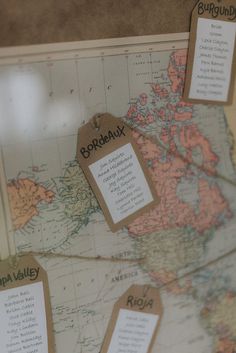 a map with some tags attached to it's sides and labels on the maps