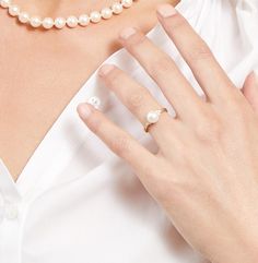 This beautiful pearl ring features a lustrous AAAA quality 7-8mm white Freshwater pearl, imported directly from the pearl farms of China. The pearl is mounted with dazzling SI clarity diamonds on a 14K gold band.
This ring is available in a number of sizes for the perfect fit. Classic White Pearl Open Ring, Classic White Pearl Ring With Pearl Charm, White Akoya Pearl Timeless Ring, Classic White Pearl Ring With Charm, Timeless White Akoya Pearl Ring, Elegant White Pearl Ring With Charm, Elegant Pearl Chain Ring, Classic Pearl Ring For Anniversary, Classic White Akoya Pearl Ring