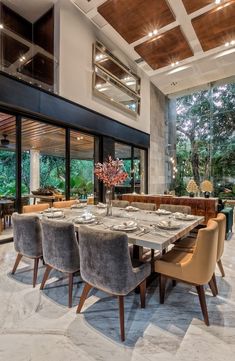 a large dining room table surrounded by chairs