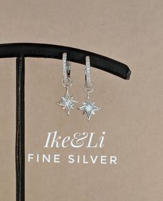 Solid 925 Sterling Silver North Star Dangle Hoop Earrings Real 925 Sterling Silver NOT SILVER PLATED High Quality Silver Earrings High polished rhodium finish gives this earrings a stunning shiny look that lasts many years. We have hundreds Silver Jewelry in stock. If you don't see what you are looking , feel free to ask us. Trendy, dainty, luxurious, classic with modern touch, elegant and fancy, fine quality made 925 Sterling Silver cubic zirconia North Star dangle hoop earrings Description Met Sterling Silver Dangle Hoop Earrings With Sparkling Stones, Elegant Silver Star Huggie Earrings, Silver Sparkling Stones Huggie Earrings For Gift, Earrings Real, Dangle Hoop Earrings, North Star, 925 Sterling Silver Jewelry, Fine Silver, Solid 925 Sterling Silver