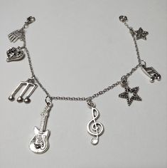 Music Themed Outfits, Silver Band Jewelry For Concert, Silver Band Jewelry For Concerts, Silver Band Bracelets For Concerts, Adjustable Silver Bracelets For Concerts, Adjustable Music-themed Bracelets For Concerts, Silver Metal Bracelets For Concert, Silver Metal Bracelets For Concerts, Adjustable Silver Music-themed Bracelets