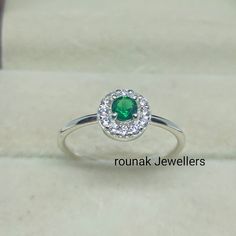 BAND- ROUNAK JEWELLERS MATERIAL- 925 STERLING SILVER GEMSTONE- EMERALD, CUBIC ZIRCONIA EMERALD STONE SIZE- 4 MM, CUBIC ZIRCONIA STONE SIZE - 1.20 MM STONE SHAPE- ROUND RING SIZE- ALL SIZE AVAILABLE GEM COLOUR- GREEN, WHITE PLEASE GIVE YOUR OPENION OR FEEDBACK ABOUT THE PRODUCT. WE ACCEPT BULK ORDER ALSO. https://www.etsy.com/in-en/shop/RounakJewellers?ref=search_shop_redirect Star Ruby Ring, Blue Sapphire Diamond Ring, July Birthstone Ring, Vintage Silver Rings, Ruby Engagement Ring, Blue Sapphire Diamond, Cubic Zirconia Rings, Sapphire Diamond Ring, Silver Rings Handmade