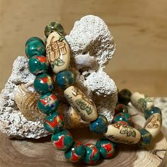 Nwot ~ Artisan Ceramic Beaded Bracelets ~ Stretch 2 ~ Artisan Bohemian Ceramic Bracelets Green/Beige/Red/Blue Approximately: 6”~ 6.5” Each Stretch Cording New And Never Worn Vintage And Preowned Items Often Have Wear And Tear From Normal Use, Improper Storage Or Care. All Items Are Presented To The Best Of My Ability And Knowledge. Please Feel Free To Reach Out With Questions Or Clarification You Might Have On An Item Prior To Purchasing. Please Manage Your Expectations When Bidding Or Purchasing, All Sales Are Binding Per Poshmark Policies. All Items Are "As Is" And Not Returnable. Thanks For Stopping By, Enjoy! Blue Bohemian Beaded Bracelets With Wooden Beads, Bohemian Blue Beaded Bracelets With Wooden Beads, Symbolic Multicolor Beaded Bracelets As Gift, Artisan Beaded Bracelets For Meditation, Artisan Handmade Bracelets For Meditation, Handmade Blue Beaded Bracelets For Festivals, Handmade Blue Beaded Bracelet For Festivals, Bohemian Blue Bracelets With Wooden Beads, Blue Bohemian Beaded Bracelets For Festivals