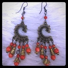 Brass Metal Color C Shape. Orange And Gold Beads. 3.25" Long Orange Dangle Chandelier Earrings For Gift, Orange Bohemian Earrings For Festive Occasions, Copper Beaded Dangle Earrings With Dangling Beads, Orange Beaded Dangle Jewelry, Orange Dangle Jewelry With Colorful Beads, Orange Teardrop Beaded Earrings With Dangling Beads, Festive Orange Dangle Jewelry, Bohemian Orange Jewelry With Dangling Beads, Orange Dangling Beads Earrings For Festival