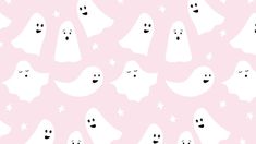 a pink background with ghost faces and stars