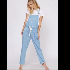 Fantastic Fawn Distressed Overalls Flat Measurements: Waist 16” Unstretched Elastic Inseam 30” Hip 22” Smoke Free Home. Casual Light Wash Distressed Denim Jumpsuit, Casual Distressed Light Wash Denim Jumpsuit, Cotton Overalls With Frayed Hem For Spring, Spring Cotton Overalls With Frayed Hem, Blue Denim Jumpsuit With Frayed Hem For Spring, Casual Light Wash Distressed Overalls, Casual Distressed Light Wash Overalls, Denim Blue Overalls With Frayed Hem, Casual Light Blue Overalls For Spring