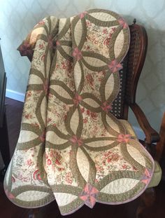 a chair with a quilt on top of it