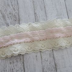 "Lovely vintage lace hairband combines an ivory flat lace and a pastel pink lace. Headband is sized for an adult or teen head size. Hair band is joined with looped elastic so head band size is adjustable. Measurement: Lace band is 2 1/4\" wide, lace piece is 21\" long and with elastic stretches to 23\". I can customize the size on this hairband. Just send me a message with your requirements." Adjustable White Lace Hair Accessories, Feminine Cream Lace With Lace Trim, Lace Hairband, Ivory Flats, Lace Headband, Lace Bands, Lace Headbands, Headband Hair, Hair Accessories Headbands