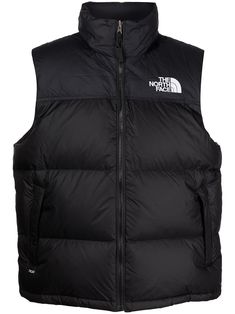 Black recycled nylon 1996 Retro Nuptse vest from THE NORTH FACE featuring down-feather filling, embroidered logo at the chest, embroidered logo to the rear, detachable hood, sleeveless, high neck, front zip fastening, two side zip-fastening pockets and straight hem. North Face Retro Nuptse, North Face Gilet, Nuptse Vest, The North Face 1996 Retro Nuptse, The North Face 1996, Hooded Gilet, North Face 1996, North Face Outfits, Stile Hijab