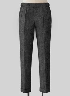 The Stone Charcoal Highland Tweed Trousers are the smartest dress that most men will need outside professional offices. Crafted from 100% wool, the trousers are beautifully tailored for a timeless appearance so that nothing can knock the blue pants in fine tweed. 
 
 Look Includes  Stone Charcoal Tweed Fabric  Cross Pocket  Forward 2 Pleats  Side Tabs (No Loops)- Arrow Shape  Bottom Cuff (1.5")  Two Welted Back Pockets on Trousers   
 You can change the look during customization if required. Formal Winter Wool Bottoms, Elegant Formal Bottoms With Herringbone Pattern, Elegant Tailored Dress Pants For Winter, Elegant Tweed Pants For Tailoring, Elegant Tweed Pants For Business, Tailored Tweed Pants For Formal Occasions, Elegant Fitted Tweed Bottoms, Elegant Wool Pants With Herringbone Pattern, Formal Tweed Pants With Herringbone Pattern