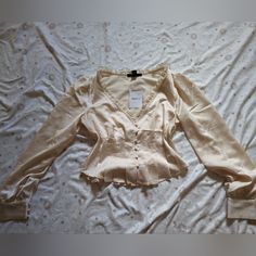 Make An Offer! Cute Button Up Long Sleeve Top In A Cream Color. Silky Material And So Pretty, Nwt. Tags: Long Sleeve, Shirt, Top, Blouse, Satin, Cream, 70s, Buttons, Lace Chic Tops With Pearl Buttons For Fall, Chic Fall Tops With Pearl Buttons, Trendy Forever 21 Tops With Buttons, Fitted Tops With Pearl Buttons, Feminine Tops With Pearl Buttons, Feminine Fitted Tops With Pearl Buttons, Chic Button-up Tops With Pearl Buttons, Forever 21 Fitted Tops With Button Closure, Feminine Fitted Top With Buttons