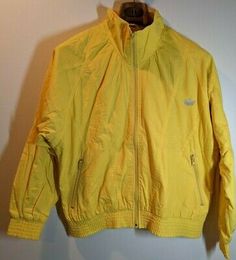 (eBay) Vintage Adidas Yellow Embroidered Bomber Jacket Men's Size X-Large Retro Track Jacket For Spring Streetwear, Retro Cotton Track Jacket For Spring, Retro Spring Track Jacket For Streetwear, Retro Cotton Windbreaker For Spring, Vintage Hooded Track Jacket For Fall, Retro Windbreaker With Pockets For Spring, Vintage Track Jacket With Pockets For Spring, Adidas Windbreaker With Pockets For Spring, 90s Style Windbreaker With Pockets For Spring