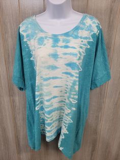 One of a kind, reverse dyed women's shirt, size 1X, but fits like a 2X. Has a swoop neck, is a longer style shirt, and very soft material. All sales are final. Tie Dye Crew Neck Top With Natural Dye, Relaxed Fit Tie Dye Tops With Natural Dye, Casual Blue Tops With Natural Dye, Spring Acid Wash Tops, Hand Dyed Acid Wash Tops With Relaxed Fit, Casual Acid Wash Tops With Natural Dye, Acid Wash Hand Dyed Relaxed Fit Tops, Spring Bleached Oversized Tops, Spring Hand Dyed Relaxed Tops