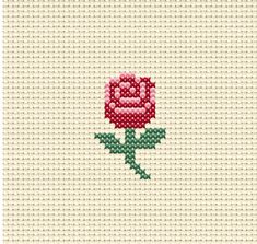 a cross stitch rose on a white background