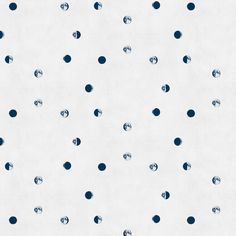 a white background with blue polka dots on the bottom and one dot in the middle