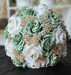 a bridal bouquet with green and white flowers