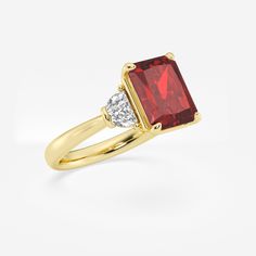 Step into the spotlight with this gorgeous ruby three stone ring, crafted with a breathtaking radiant cut. This showstopper will draw admirers in with its mesmerizing red color, while the unique faceting creates a dazzling display of scintillation. Complemented by diamond side stones, this ring strikes the perfect balance between bold and timeless. Fine Jewelry Ruby Ring With Radiant Cut Diamond, Elegant Emerald Cut Three Stone Birthstone Ring, Fine Jewelry Ruby Ring With Radiant Cut Center Stone, Radiant Cut Ruby Ring In Fine Jewelry Style, Radiant Cut Ruby Ring With Center Stone, Luxury Ruby Jewelry Radiant Cut, Emerald Cut Three Stone Birthstone Ring For Formal Occasions, Ruby Ring With Radiant Cut For Formal Events, Classic Ruby Ring With Radiant Cut