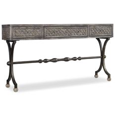 an ornate console table with two drawers on one side and metal handles on the other