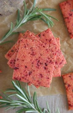 crackers with rosemary sprigs on top of them