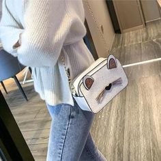 #SS0520 Material: PU Color: black, white Size: 19cm*12cm*7cm Shoulder strap length: 120cm Shipping: Free Shipping Worldwide for order over 15$, 7-15 days delivery to US/UK/CA/AU/FR/DE/IT and most Asia Countries Trendy White Phone Bag With Adjustable Strap, Cute White Shoulder Bag For Party, Trendy White Shoulder Bag, Casual White Rectangular Phone Bag, Casual White Phone Bag For Daily Use, White Casual Phone Bag For Daily Use, White Rectangular Phone Bag For Party, Trendy Cat Design Crossbody Shoulder Bag, Trendy White Rectangular Phone Bag